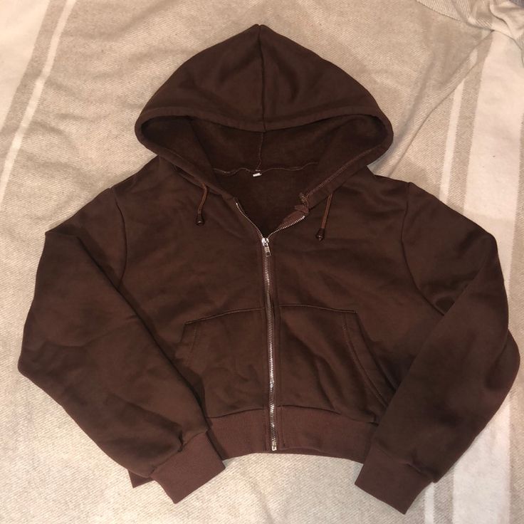 Super Soft, Fleece Zip Up Hoodie, Size Large But Is Very Cropped And Fits More Like A Small. Never Worn, No Pilling. Cheap Brown Outerwear For Streetwear, Cheap Brown Hoodie With Letter Print, Cheap Brown Tops For College, Zip Up Sweater Brown, Trendy Hooded Fleece Jacket, Brown Fleece Hooded Top, Brown Hooded Fleece Top, Brown Zip Up, Brown Zip Up Hoodie