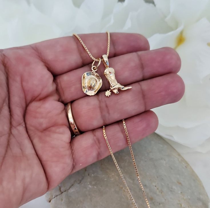 Gold Cowboy Boot and Hat Necklace, Texas Necklace, Dainty Cowgirl Necklace, 14k Heavy Plated Gold Necklace, For Women, Teens, Girls for just $32.90 #CowboyBoots #CowgirlNecklace #TexanJewelry #CowboyHat #CowgirlJewelry #14kTexasNecklace #14kGoldChain #CowboyNecklace #TexasNecklace #14kGoldNecklace Tiny Cowboy Hat, Cowgirl Necklace, Texas Necklace, Cowgirl Necklaces, Authentic Gold, Surf Jewelry, Chapeau Cowboy, Classy Jewelry, Cow Girl