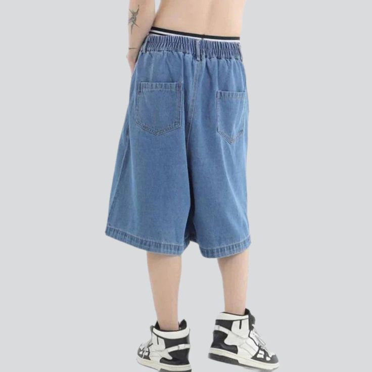 Take your look to the next level this summer with our retro baggy men's denim shorts from the 2023 Collection. Combining the timeless trend of denim with the couture trend of y2k fashion. these shorts will become your go-to piece for any occasion. Featuring a medium-rise fit. zipper and button closures. and a variety of colors. these shorts are the perfect blend of comfort and vibe.Distinctive Features: Y2K Style: Inspired by the latest Y2k trendy trends. these shorts are a stylish vogue stateme Y2k Style Denim Jean Shorts For Streetwear, Y2k Denim Jean Shorts For Streetwear, Baggy Blue Jean Shorts For Streetwear, Blue Baggy Jean Shorts For Streetwear, Baggy Y2k Denim Shorts, Y2k Style Jean Shorts For Summer Streetwear, Baggy Jean Shorts For Summer Streetwear, Y2k Jean Shorts For Streetwear, Y2k Style Relaxed Fit Streetwear Shorts