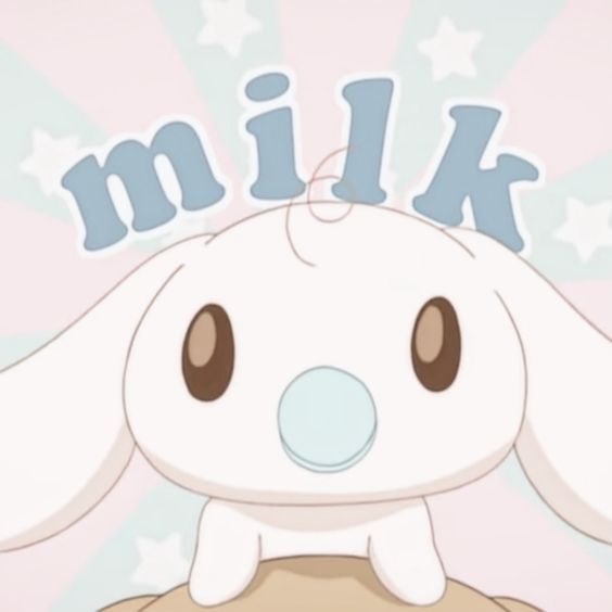 a cartoon rabbit with the word milk on it's head and stars in the background