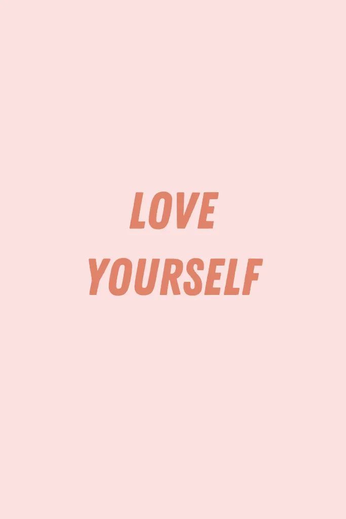 the words love yourself against a pink background