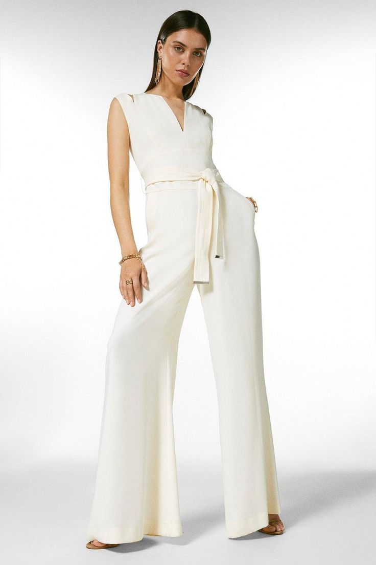 Cut A Powerful Figure In This Jumpsuit. Showcasing A Tailored Wide-Leg Silhouette, This All-In-One Is Panelled At The Bodice And Features A Self-Tie Belt To Further Define The Waist. Finished With Alluring Cut-Outs And A Twisted-Effect Back, Its Stitching Detail And Ultra-Glossy Trims Are A Luxe Touch. Chic Belted Jumpsuits And Rompers, Formal Full-length Jumpsuits And Rompers For Spring, Full Length Formal Jumpsuits And Rompers For Spring, Elegant Belted Solid Jumpsuits And Rompers, Belted Wide-leg Jumpsuit For Work, Wide-leg Belted Jumpsuit For Work, Belted Wide Leg Jumpsuits For Work, Wide Leg Workwear Jumpsuits With Tie Waist, Workwear Wide Leg Belted Jumpsuits And Rompers