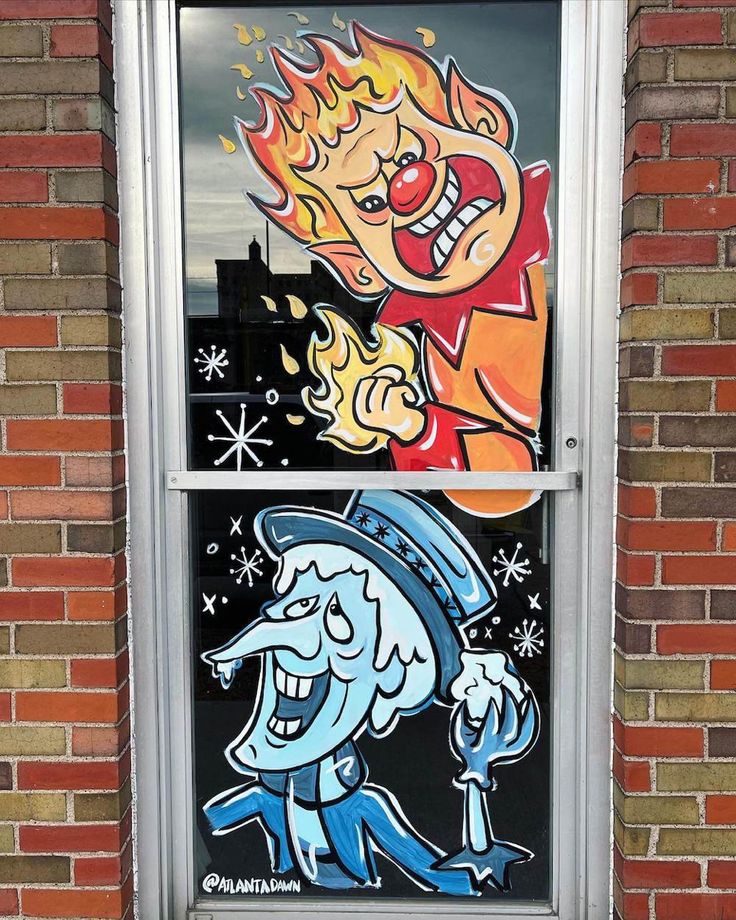 a window with two cartoon images on it