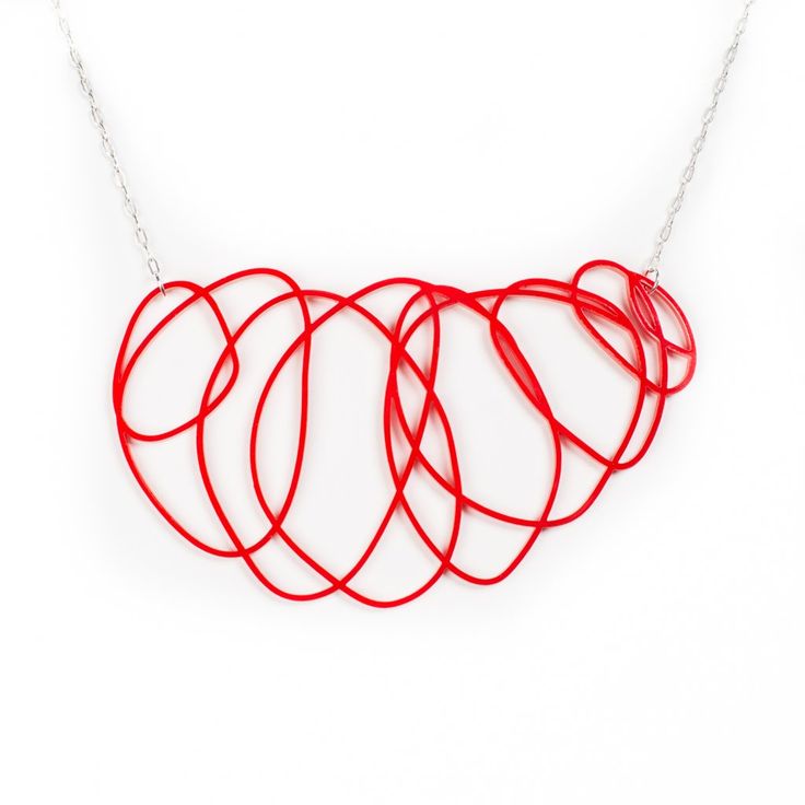 People are def going to notice your stunning sense of style when wearing this delicate red statement necklace. The red calligraphic lines turn this necklace into a work of art that you can wear. Show off your creative sense of style and be happy wearing an unique accessory. DETAILS This delicate red statement necklace is made from laser-cut red acrylic. It's safe, durable and lightweight. The red pendant itself is about 5 inches long; the chain is 14 inches long. The necklace usually lies below Red Minimalist Pendant Necklace, Minimalist Red Pendant Necklace, Modern Red Necklace For Gift, Modern Red Necklace For Party, Modern Red Necklace Perfect As A Gift, Modern Red Adjustable Necklace, Red Pendant, Yellow Gifts, Big Necklace