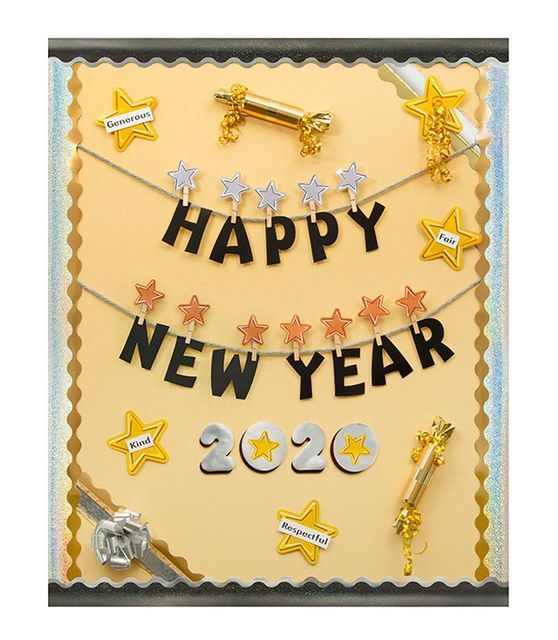 a happy new year card with gold and silver decorations on it's edges, hanging from a string