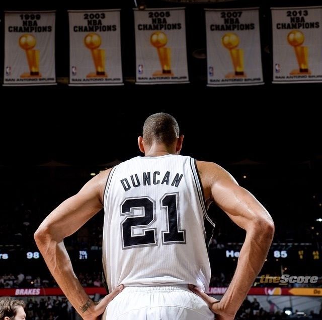 a basketball player with his back to the camera