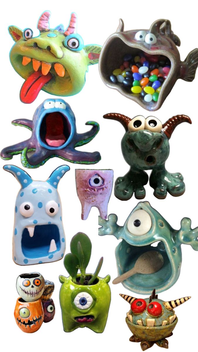 some strange looking toys are in the shape of animals and monsters with their mouths open