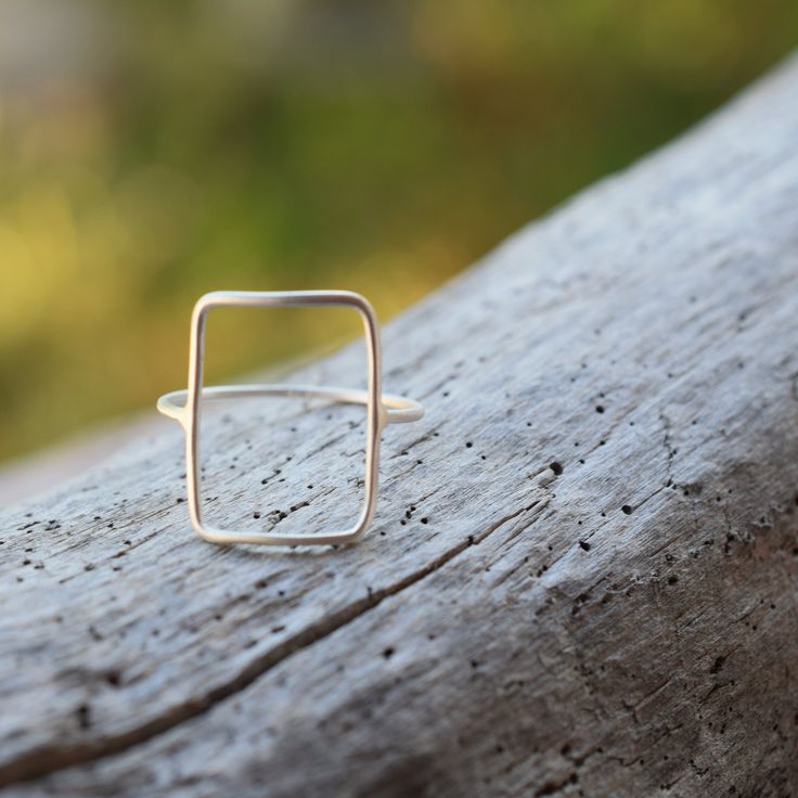 Upgrade with Express DHL shipping at checkout or purchase this listing with your order https://www.etsy.com/listing/879842121/upgrade-for-dhl-express-delivery Handmade skinny , Rectangle shaped sterling silver ring , geometric contemporary ring 1 mm thick All our products are handmade in our little workshop with much care and love. You are welcome to send us a message if you have any questions! Best, Christina OPTION TO UPGRADE AT CHECKOUT WITH DHL Express FOR DELIVERY IN 3-5 DAYS Handmade Rectangular Minimalist Rings, Handmade Minimalist Rectangular Rings, Minimalist Silver Square Cut Ring, Minimalist Rectangular Rings As Gifts, Minimalist Rectangular Stackable Rings, Minimalist Square Cut Promise Ring, Modern Handmade Stackable Rings For Everyday, Minimalist Sterling Silver Oblong Jewelry, Minimalist Silver Square Ring