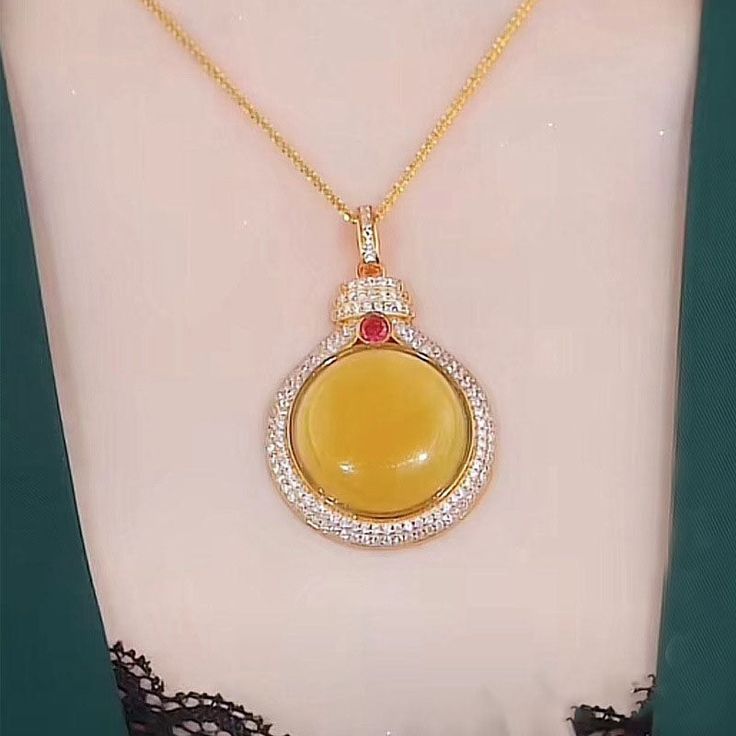 Experience the beauty and elegance of our Round Natural Agate Necklace, adorned with sparkling diamonds. Handcrafted with precision and care, this necklace brings a touch of sophistication to any outfit. Made of natural agate, its unique pattern and color add a touch of individuality to your look. Perfect for any occasion.

Natural agate 

Pendant size:32*32mm

Weight about: 11g

Chain length: 40 CM (+ 5 cm adjustable chain)

Adjustable lobster clasp size - one size fits all

High quality zinc a Luxury Jade Necklace For Formal Occasions, Luxury Formal Jade Necklace, Gold Chalcedony Jewelry As A Gift, Elegant Jade Cabochon Necklace, Luxury Jade Necklace For Gift, Diamond Cabochon Pendant Necklace, Formal Fine Jewelry Jade Necklace, Spiritual Agate Pendant Jewelry, Luxury Yellow Gold Jade Necklaces