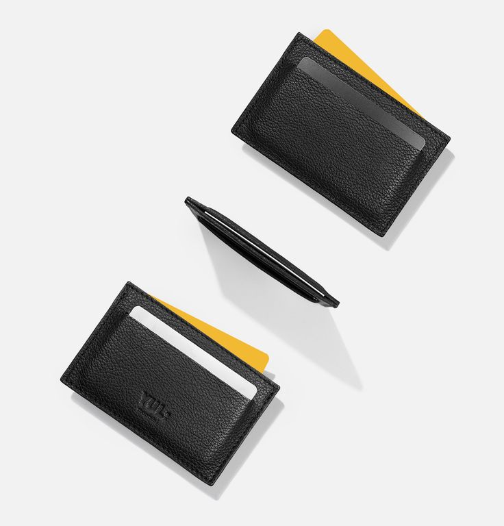 A timeless card wallet. Porte-cartes is a slim cardholder designed to fit standard business and credit cards. One slot on each side and a middle slot easily fits 6 cards in your pocket without looking bulky. Handcrafted from our signature matte black pebbled cowhide with fine-grain interior mesh and hand-painted exterior edges. + Width: 4.25in / 11 cm+ Height: 2.75in / 7 cm+ Depth: 0.25in / 1 cmHandmade in Montréal in limited quantities. We offer free ground shipping for orders in US and Canada Luxury Designer Card Holder For Daily Use, Modern Business Card Holder With Card Slots, Modern Formal Card Holder With Card Slots, Formal Bifold Card Holder With Card Slots, Classic Card Holder With Id Window For Daily Use, Modern Card Holder With Card Slots, Classic Card Holder With Card Slots For Formal Use, Classic Bifold Card Holder With Card Slots, Classic Bifold Card Holder With Slots