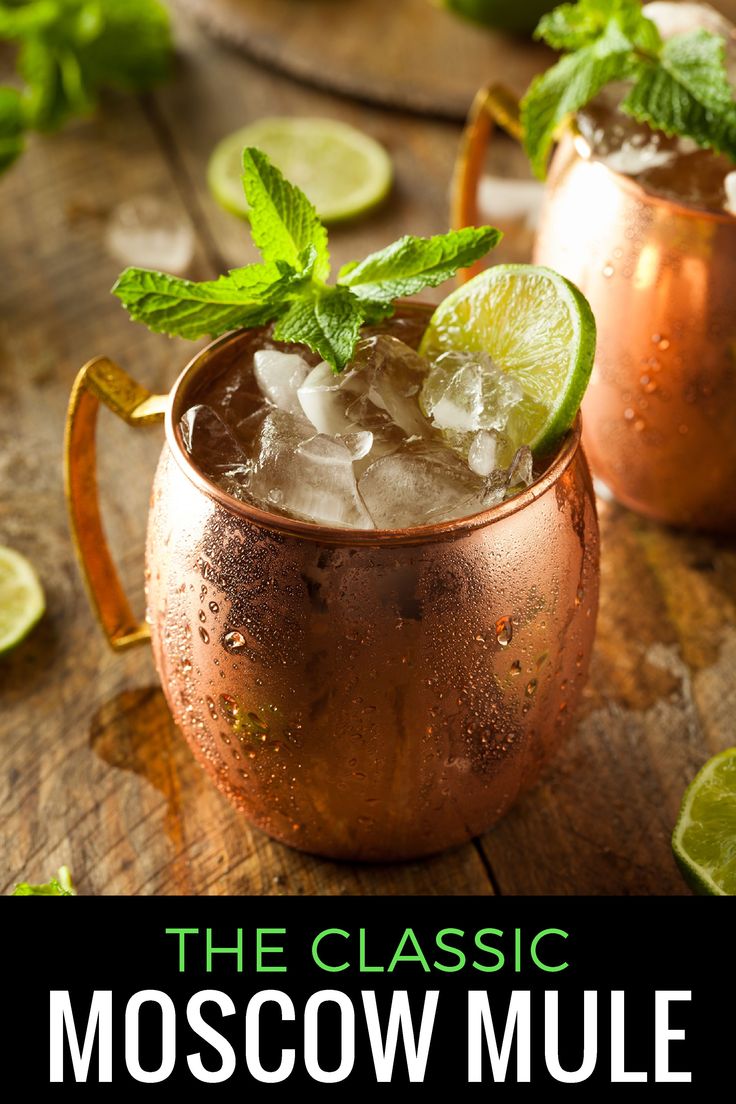 two copper mugs filled with ice and lime