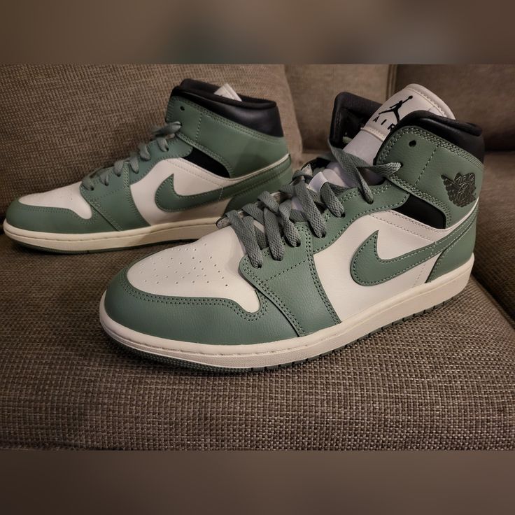 I’m Selling A Brand-New Pair Of Air Jordan 1 Mid Sneakers In Size 11.5. Unfortunately, These Didn’t Fit My Son, And The Store I Purchased Them From Doesn’t Accept Returns. The Shoes Have Never Been Worn Outside And Are In Perfect Condition. This Classic Colorway In Sail And Jade Smoke Is Versatile And Iconic, Making These Jordans A Great Addition To Any Sneaker Collection. Key Features: Brand New, Never Worn Size: 11.5 Colorway: Sail/ Jade Smoke/ Anthracite Purchased For $90, Selling For $75 If Green High-top Jordan Shoes For Streetwear, Green Mid-top Jordan Shoes For Streetwear, Nike Green Lace-up High-top Sneakers, Green Mid-top Jordan Shoes With Boost Midsole, Nike Green High-top Sneakers, Green Mid-top Custom Sneakers With Cushioned Footbed, Casual Jordan High-top Shoes With Air Max Cushioning, Green High-top Synthetic Jordan Shoes, Green Low-top Jordan Shoes