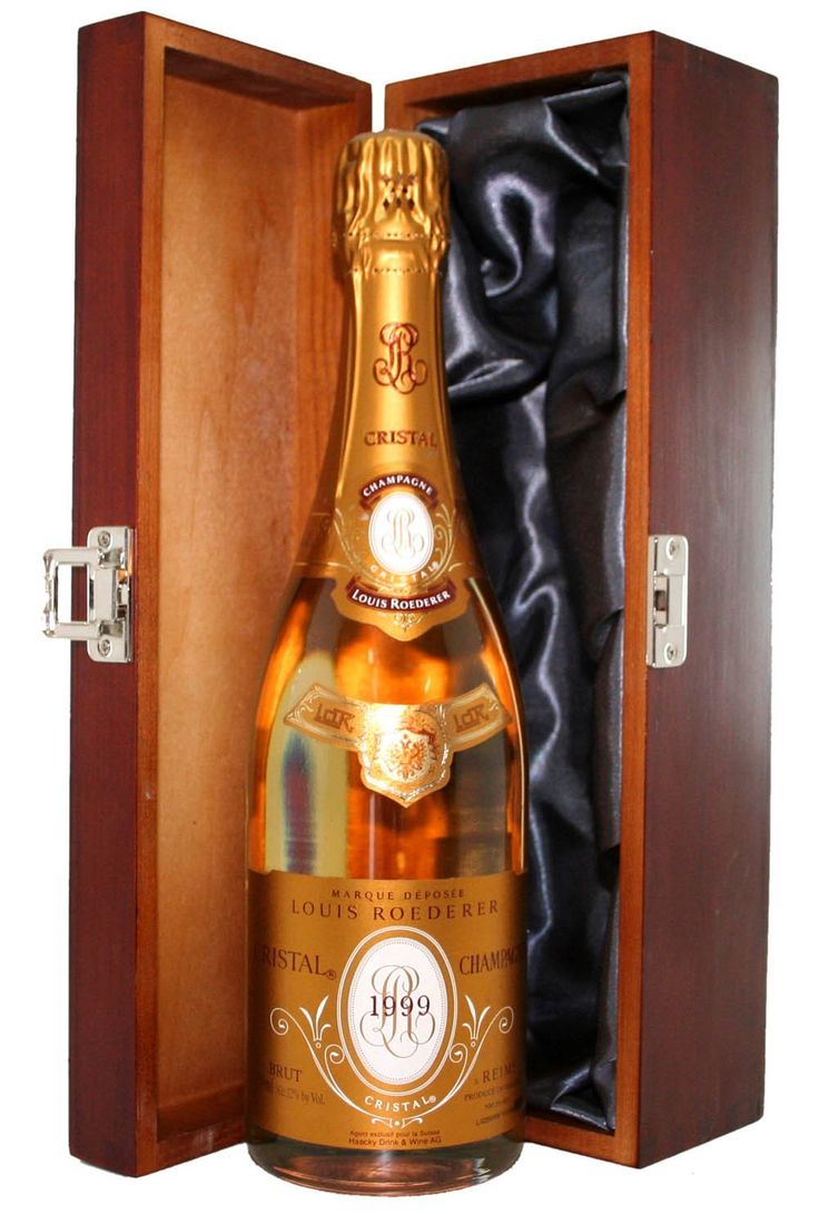 a bottle of champagne in a wooden box