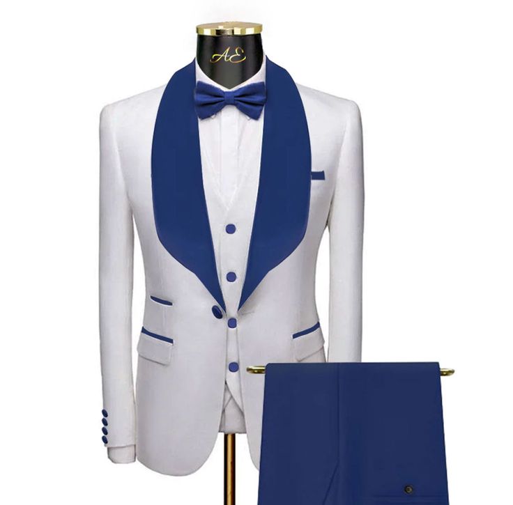 a white suit with blue lapel collar and bow tie on a mannequin