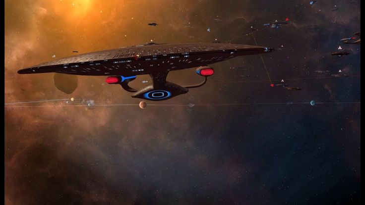 a star trek ship flying through space with other ships in the background and planets around it