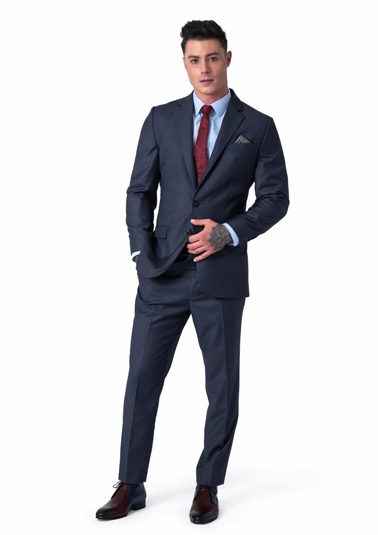 Delivered in as little as two weeks. Jacket & pants included. Vest optional. Covered by our Free Remake Guarantee. Complete the look with Shirts, Ties & Squares. Elegant Slim Fit Suits With Pressed Crease, Elegant Office Suits With Pressed Crease, Elegant Custom Fit Three-piece Suit With Welt Pockets, Elegant Slim Fit Suit With Notch Lapel, Elegant Custom Fit Suit For Work, Elegant Slim Fit Suits For Semi-formal Occasions, Elegant Slim Fit Semi-formal Suit, Elegant Semi-formal Suit With Suit Collar, Elegant Custom Fit Suit And Tie Accessories For Work