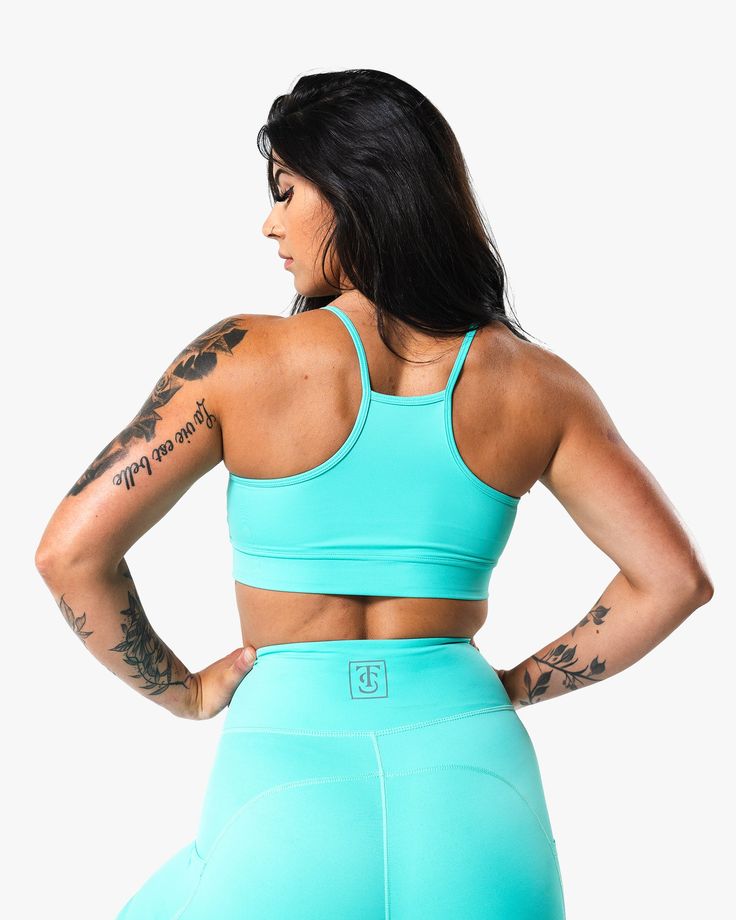 Our Women's Pro Sports Bra, shown here in Caribbean blue, offers medium support to its user. Designed with an active approach, the bra allows for a full range of motion while maintaining full coverage. The chest has the iconic TS box logo in a reflective print for maximum visibility in low light conditions. 73% Polyester, 27% Spandex Reflective TS Box Chest Logo Lightweight Fabric Spaghetti Straps Elastic Band for Secure Fit MODEL IS 5'10", WEARING SIZE M Box Chest, Caribbean Blue, Pro Sports, Box Logo, Low Light, Range Of Motion, Lightweight Fabric, Elastic Band, Sports Women