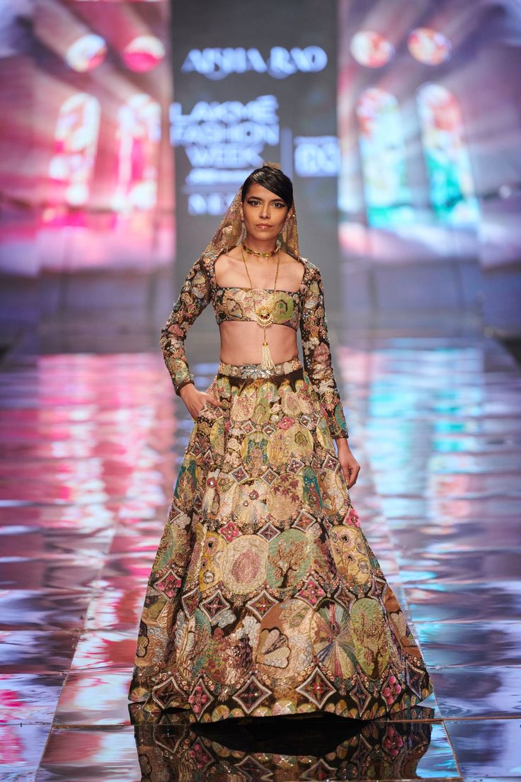 Antique gold Trencadís printed and embellished heavy kali lehenga with blouse and cutwork dupatta DELIVERY TIMEPlease allow 6-8 weeks for your outfit to arrive. FABRIC DETAILSAntique gold Professional cleaning only Navratri Brocade Lehenga With Sheer Dupatta, Brocade Lehenga With Sheer Dupatta For Navratri, Designer Lehenga With Resham Embroidery, Designer Saree Lehenga With Resham Embroidery, Designer Resham Embroidery Lehenga, Designer Lehenga With Dupatta In Traditional Drape, Designer Lehenga With Traditional Drape And Dupatta, Designer Lehenga With Intricate Embroidery And Traditional Drape, Designer Festive Dresses With Dupatta