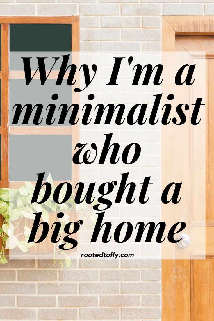 a door with the words why i'm a minimalist who bought a big home