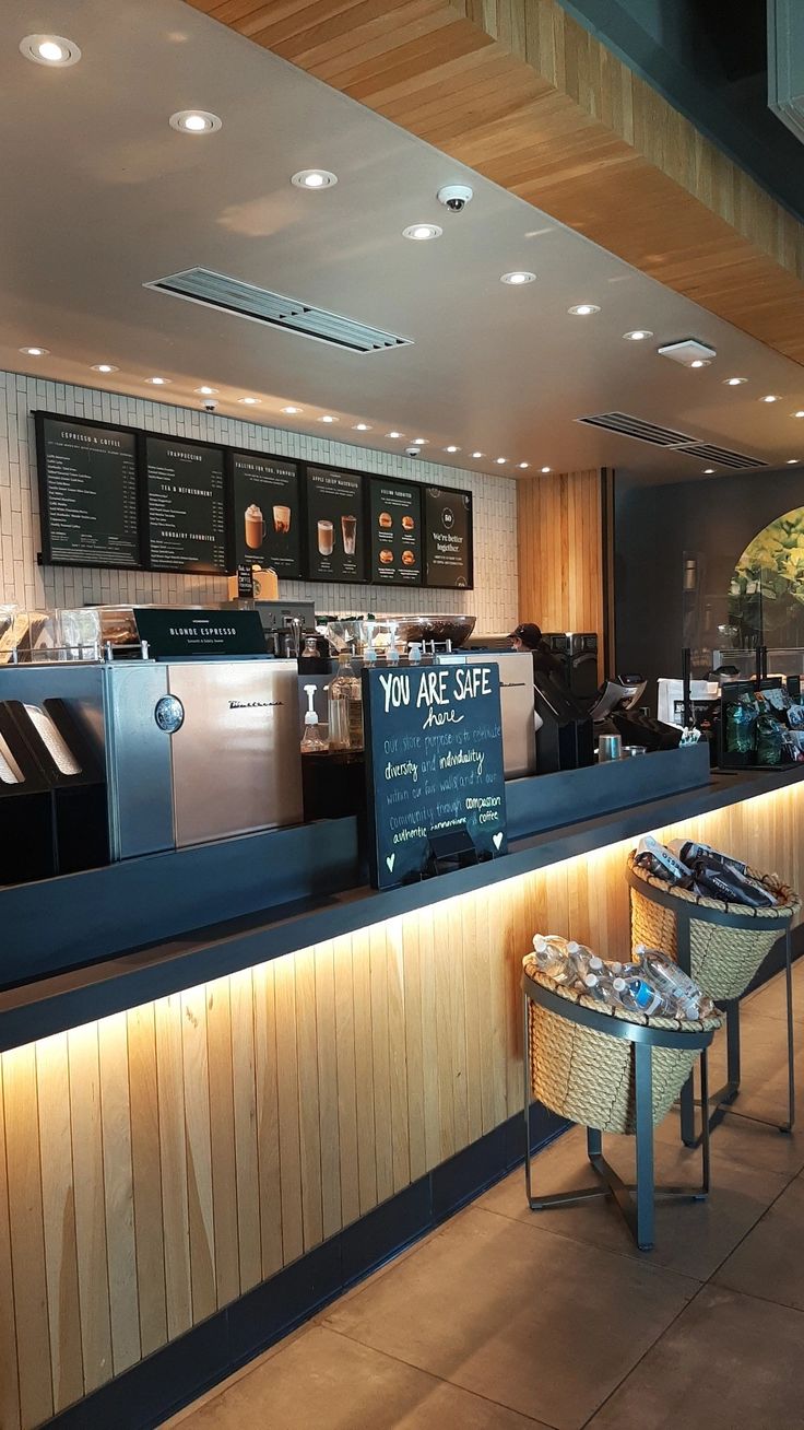 an empty restaurant with food on the counter