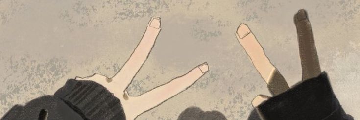 two hands reaching up towards each other with their fingers in the air and one hand holding something