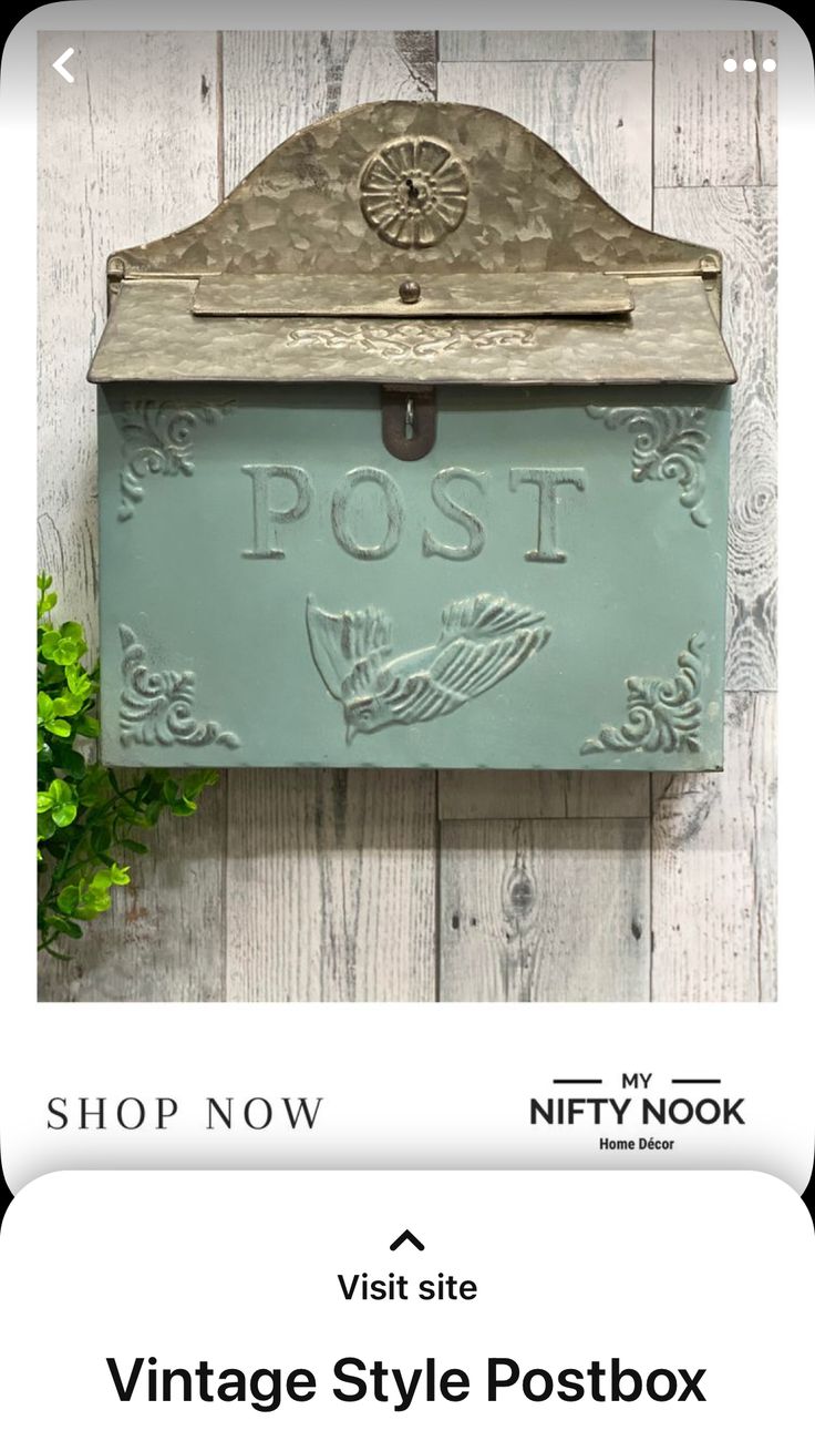 the vintage style postbox is on sale for $ 10, and it's in mint green