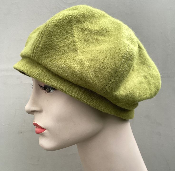 This cute 6 panel beret is handmade in a piece of recycled green wool and there is a self covered button on the top. It has an inner cotton moleskin band for comfort and brown cotton lining. *Head size M to fit 57cms/22.4 inches *Dry clean To see more of my hats please click https://www.etsy.com/uk/shop/OverToYou I design, pattern cut and create all my hats in sunny Brighton in the South of England. All my designs are original and combine timeless elegance with a modern twist. I despatch my hats Green Wool Hat For Fall, Green Wool Hat With Curved Brim, Handmade Casual Beret One Size, Casual Handmade Beret, One Size Fits Most, Green Wool Cap, Army Green Beret, Casual Hand-knitted Beret One Size, Black Velvet Top, Velvet Hat