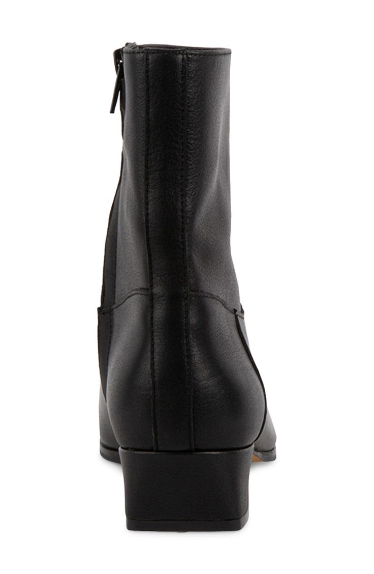 A slender square toe and low block heel balance a sophisticated bootie fitted with a side zipper for easy entry. 1 1/4" heel 6 1/4" shaft Side zip closure Leather upper/textile lining/synthetic sole Imported Classic Boots With Stacked Heel For Business, Fitted Leather Mid-calf Boots For Business, Elegant Boots With Zipper Closure In Medium Width, Fitted Chelsea Ankle Boots For Business, Business Chelsea Ankle Boots, Formal Ankle Moto Boots With Stacked Heel, Formal Moto Boots With Stacked Heel, Fitted Ankle Chelsea Boots For Business, Formal Boots With Zipper Closure And Block Heel