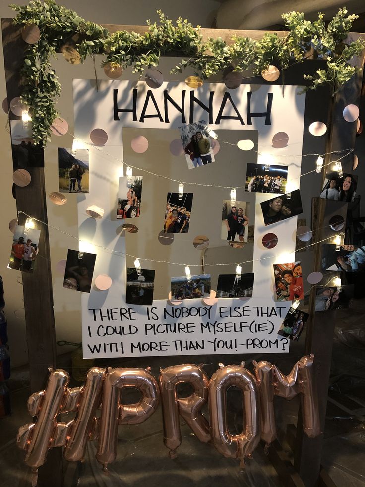 a sign that says hannah with pictures on it and balloons in the shape of letters