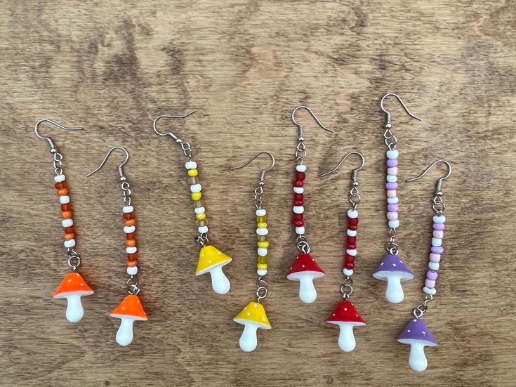 Brightly colored dangly mushroom earrings! Home made with love 💕 Whimsical Dangle Earrings With Mushroom Design, Home Made Earrings, Mushroom Earrings, How To Make Earrings, Made With Love, Home Made, Favorite Things Gift, Wedding Shop, Jewelry Earrings Dangle