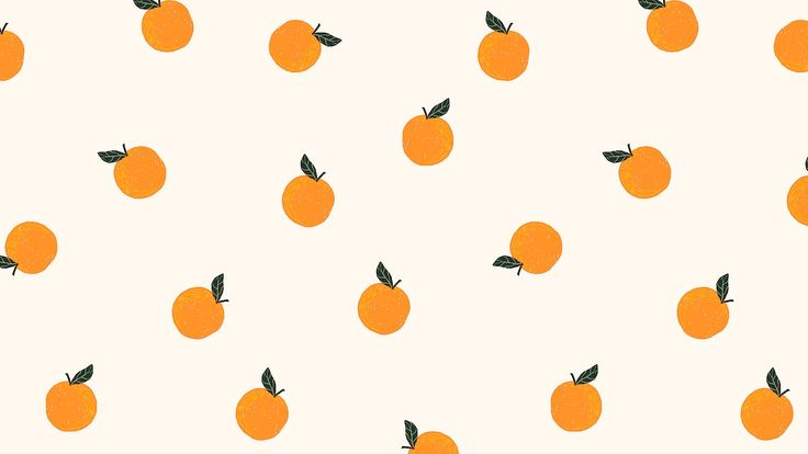 an orange pattern on a white background with green leaves and black dots in the middle