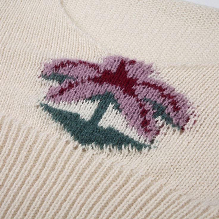 Introducing the Maiya Palm Knit Sweater, a perfect blend of cozy comfort and playful style. Crafted from soft, high-quality knit fabric, this sweater offers a snug fit that flatters your figure while keeping you warm. The standout feature is the charming palm tree design embroidered on the front, adding a touch of whimsy to your everyday look. The off-white color makes it versatile, easy to pair with your favorite jeans or skirts for a chic, laid-back ensemble. With its long sleeves and subtle s Palm Tree Graphic, White Long Sleeves, Vintage Jumper, Stunning Tops, Tree Graphic, Metallic Prints, Long Sleeve Pullover Sweater, Cozy Knit, Long Crop Top