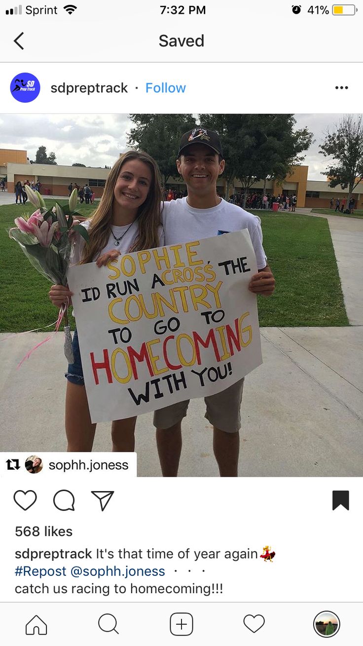 two people holding flowers and a sign that says i'd run a race the country to go to home coming with you