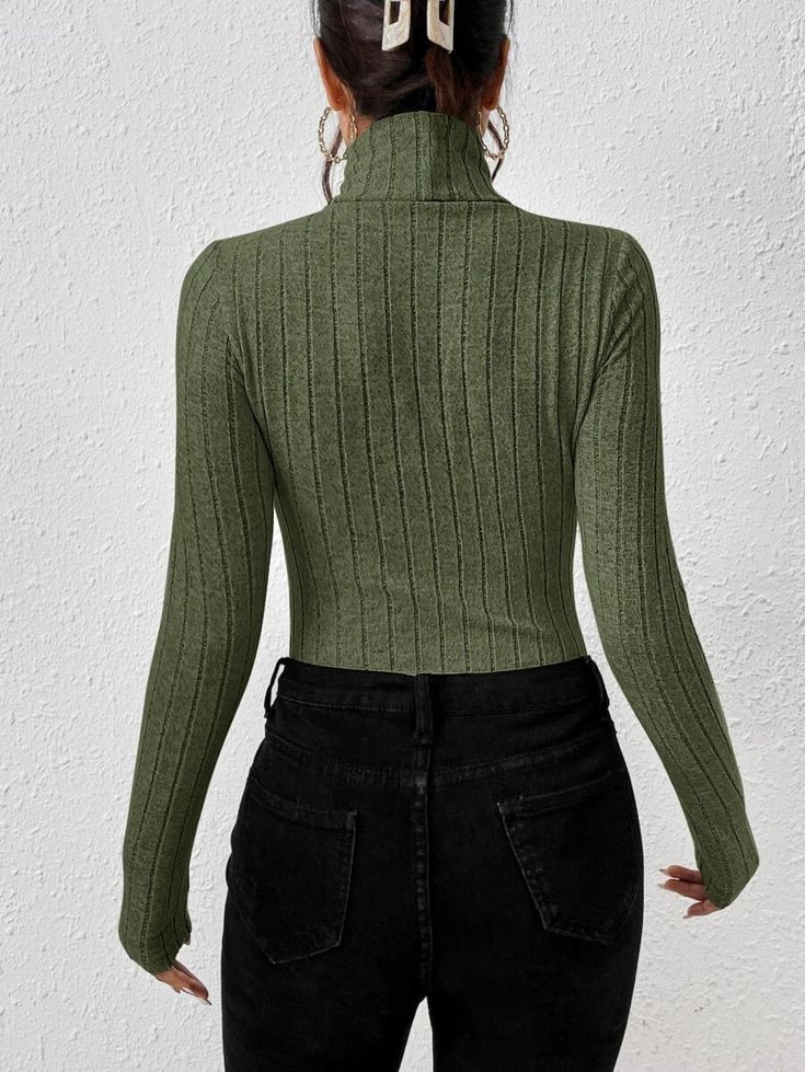 Put some extra thrill in your wardrobe with this vibrant Turtleneck Ribbed Knit Tee Bodysuit. Soft, stretchy, and clingy, this bodysuit will be sure to make them swoon. Keep your look simple and sleek or spice it up with a few statement accessories - the choice is yours. For an ultra-dynamic look, you won't want to miss out on this one. Keep them swooning. Specifications: Style: Casual Pattern Type: Plain Type: Tee Neckline: High Neck Details: Rib-Knit Sleeve Length: Long Sleeve Sleeve Type: Reg Trendy Ribbed Bodycon Top, Casual Ribbed Bodycon Top, Trendy Bodycon Tops For Fall, Trendy Stretch Bodysuit For Fall, Fitted Solid Color Bodysuit For Fall, Stretch Ribbed Bodysuit With High Neck, Trendy Non-stretch Bodysuit For Fall, Trendy High Stretch Ribbed Bodysuit, Stretch Ribbed High Neck Bodysuit