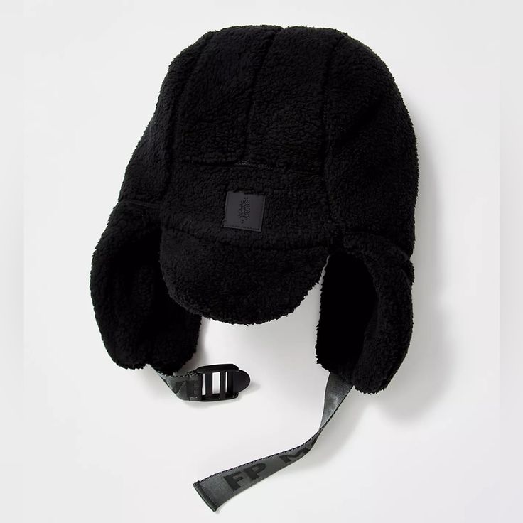 Perfect For Winter Weather 100% Polyester Cozy Up In This All-Fleece Trapper Hat From Fp Movement. Features: Trapper Style, Fleece Fabrication, Mini Brim, Ear Flaps, Branded Webbing Chin Straps Boho Beanie, Free People Hat, Flower Scrunchie, Boho Belts, Trapper Hat, Free People Jewelry, Free People Accessories, Trapper Hats, Leather Harness