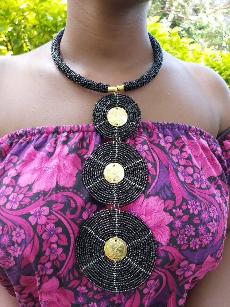 This is a fully handmade black African necklace, it is made using black longlasting fine beads. This necklace is a great jewellery piece and will match with most outfits. It is also a perfect gift for friends and family. This necklace is also available in any other colour you would prefer, request for customization by texting us or just leave a note after placing your order saying your preferred color. The necklace is very easy to put on and remove and also it is light. We offer fast shipping wo Traditional Adjustable Black Beads Choker, Traditional Long Beaded Necklace With Black Beads, Traditional Long Necklace With Black Beads, Black Long Necklace Gift, Black Round Jewelry With Large Beads, Unique Black Necklaces With Polished Beads, Adjustable Black Necklace, Unique Black Jewelry With Large Beads, Unique Black Polished Bead Jewelry