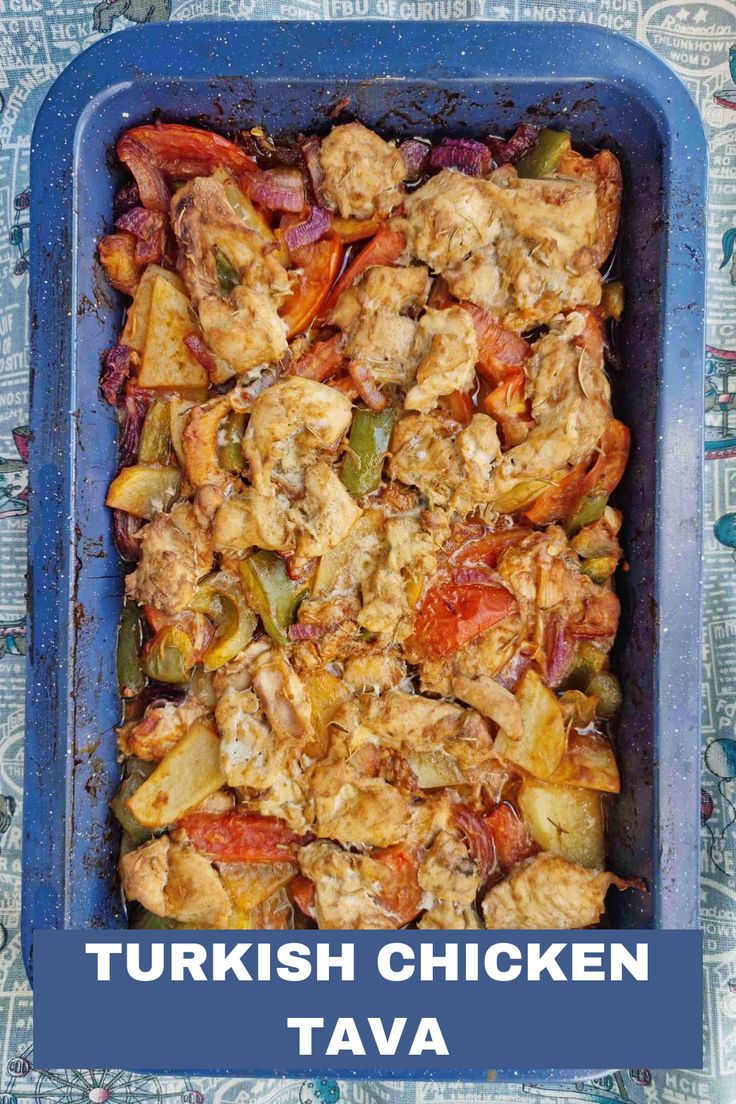 a blue casserole dish filled with chicken, peppers and onions next to the words turkish chicken tava