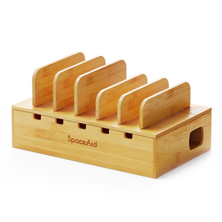 four wooden knives in a holder with the word spoons ad on it's side