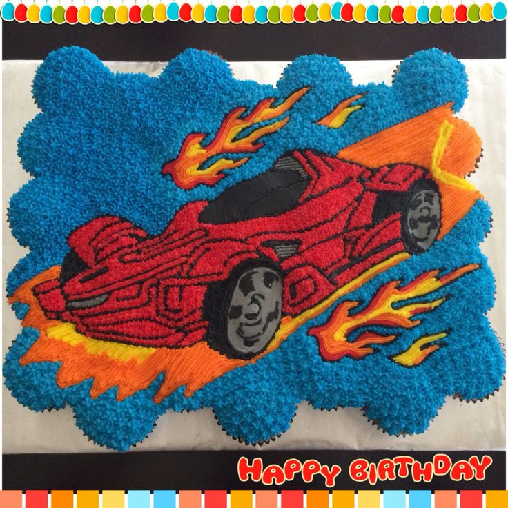 a birthday cake that looks like a car with flames coming out of the engine and wheels