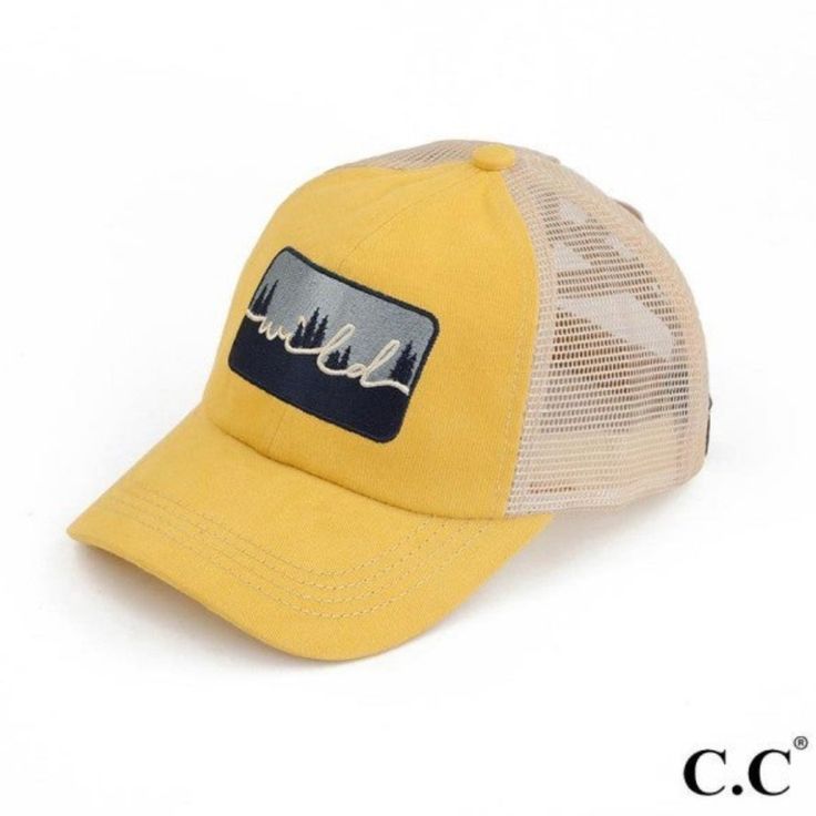 a yellow trucker hat with the word chill on it