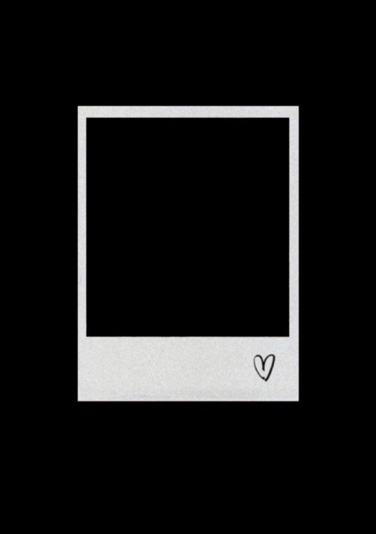 a white square frame with a heart on the bottom and black background in the middle