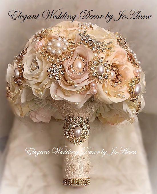 a bridal bouquet with pearls and brooches