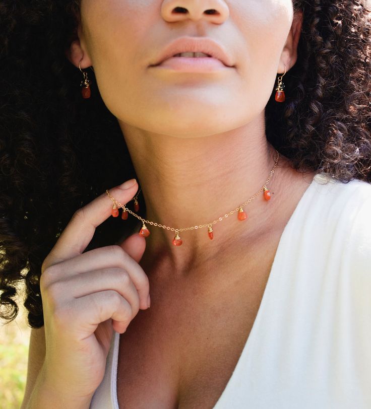 Embrace the magic of Carnelian with our natural multi-teardrop necklace! Handcrafted with authentic Carnelian gems, this necklace is perfect for that classic look. And for those who love a boho-chic style... this piece plays well with others and loves to be layered!Carnelian, an orange variety of Quartz, is said to act as an energy booster, stimulating your motivation, endurance, and courage. So go ahead, let this dainty piece turn heads and hearten your spirits!This piece will be hand-made in y Orange Gemstone Drop Jewelry, Orange Drop Gemstone Jewelry, Dainty Carnelian Gemstone Jewelry, Carnelian Gemstone Drop Jewelry, Spiritual Teardrop Carnelian Jewelry, Gold Carnelian Teardrop Jewelry, Energy Booster, Natural Gemstone Necklace, Carnelian Necklace