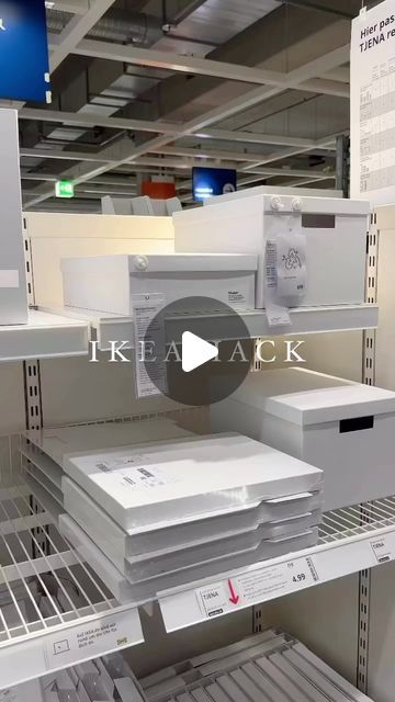 the shelves are filled with boxes and other items for sale in an ikea store