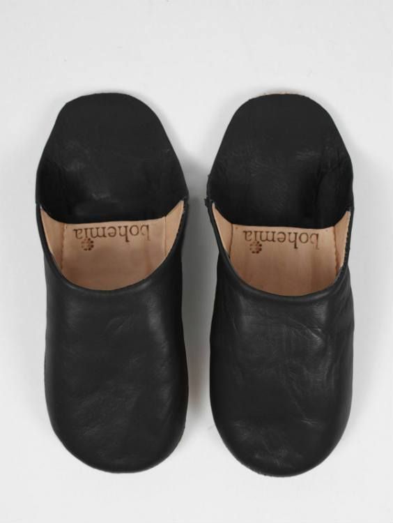 Moroccan Babouche Slippers - a classic bespoke pair of soft leather slippers handmade using the traditional techniques of skilled leather artisans. These leather slippers are a chic home accessory and the perfect gift for her, with free shipping. - 100% leather - for indoor use only - Ethically Handmade in Morocco - Free US Shipping Elegant Black Leather Slippers, Black Leather Indoor Slippers, Black Leather Slippers With Leather Lining, Black Leather Slippers With Leather Sole, Comfortable Black Leather Slippers, Comfortable Black Slippers With Leather Sole, Leather Closed Toe Indoor Slippers, Black Leather-lined Slip-on Clogs, Black Leather Lined Slip-on Clogs