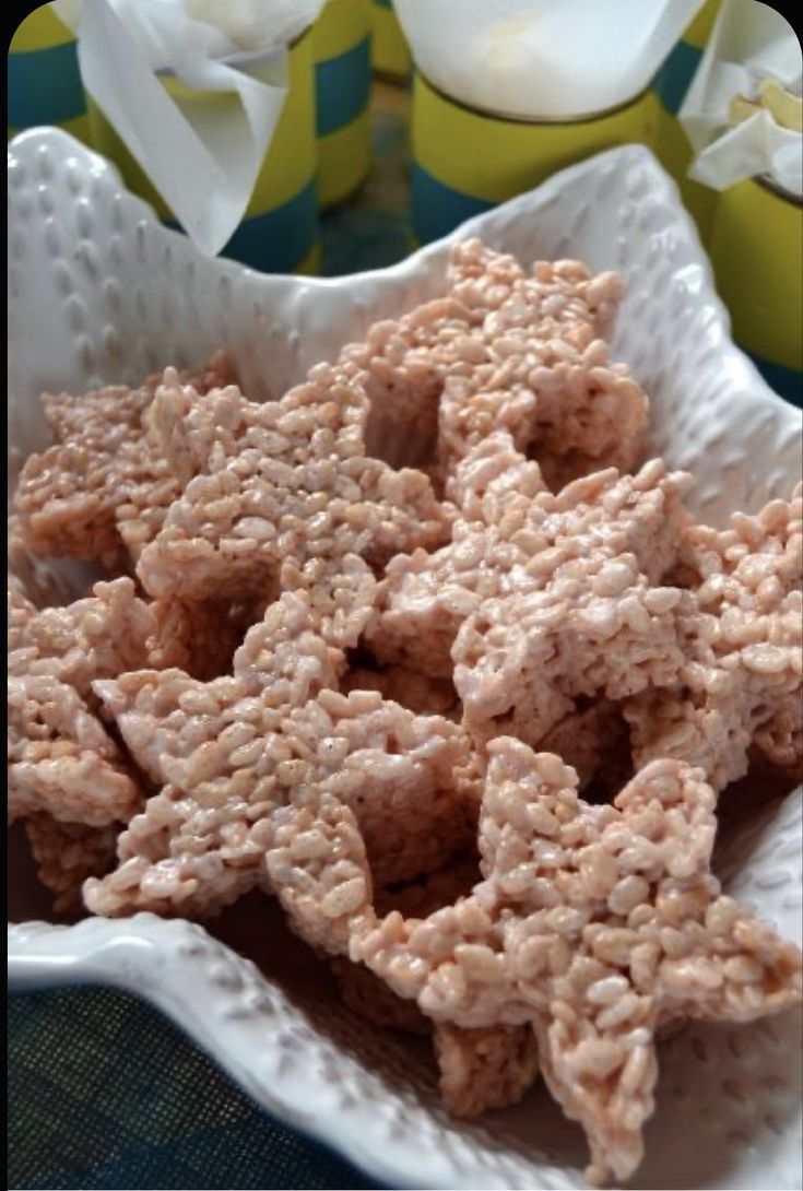 pink marshmallow rice crispies in a white bowl