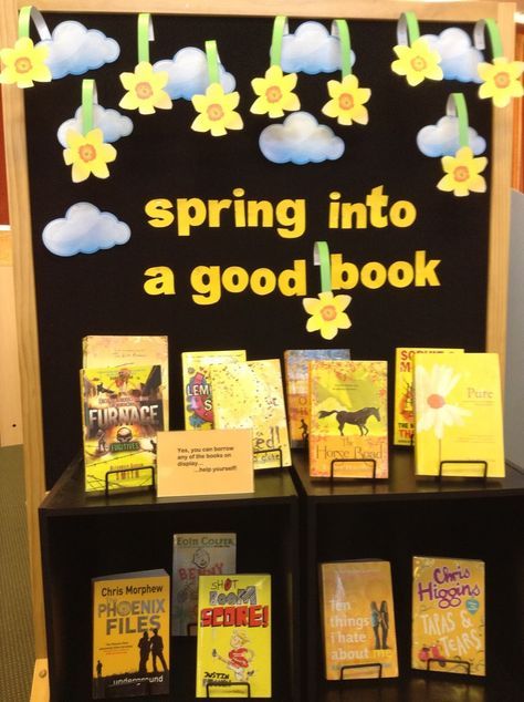 there are many books on display at the book fair and it is spring into a good book