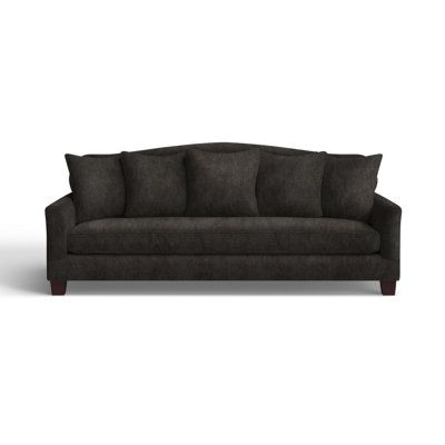 an image of a couch with pillows on the top and bottom half, in grey fabric