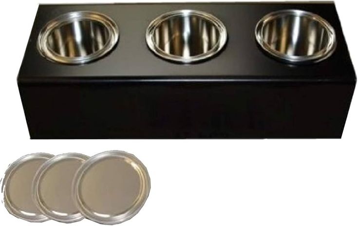 three stainless steel dog bowls with lids in front of a black box and white background