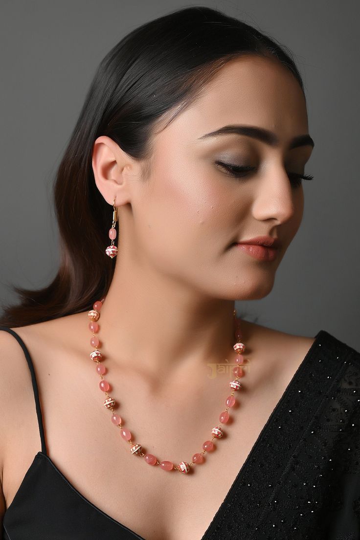 Peach Stone Meenakari Beads Long Mala Beaded Necklace Bead Jewelry Indian Long necklace Sari Necklace Indian Long Necklace This necklace is a most elegant and perfectly crafted necklace to bejewel your neckline with dancing meenakari beads that will create a style statement wherever you go. Pair this gorgeous replica of Western jewelry with your ethnic or contemporary ensembles and create a look to remember. * Necklace Length: 16 Inches (comes with adjustable Lock) * Earrings Length: 1 inch appr Festive Beaded Necklaces With Round Beads, Celebration Pearl Necklace With Dangling Round Beads, Festive Beaded Necklace, Festive Round Beads Necklace For Gift, Celebration Mala With Round Gemstone Beads, Festive Gemstone Beads Jewelry, Festive Round Beaded Necklace For Gift, Festive Gift Beaded Necklaces With Polished Beads, Pink Temple Jewelry Style Beaded Necklace As Gift